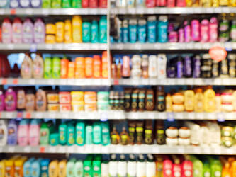 blurred FMCG products on supermarket shelves